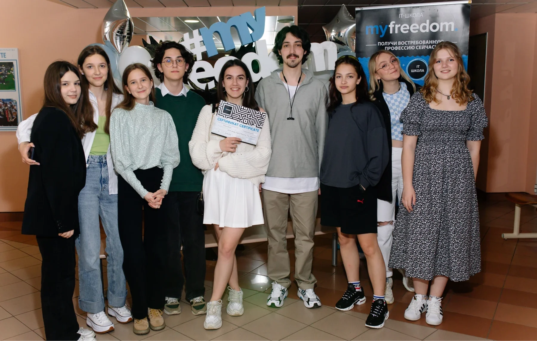 Vlad with a group of teenage design students